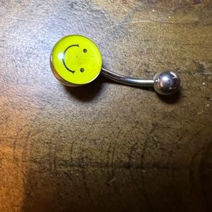 Happy face belly ring
